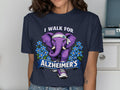 Purple elephant with forget-me-nots and banner saying "I walk for Alzheimer's".