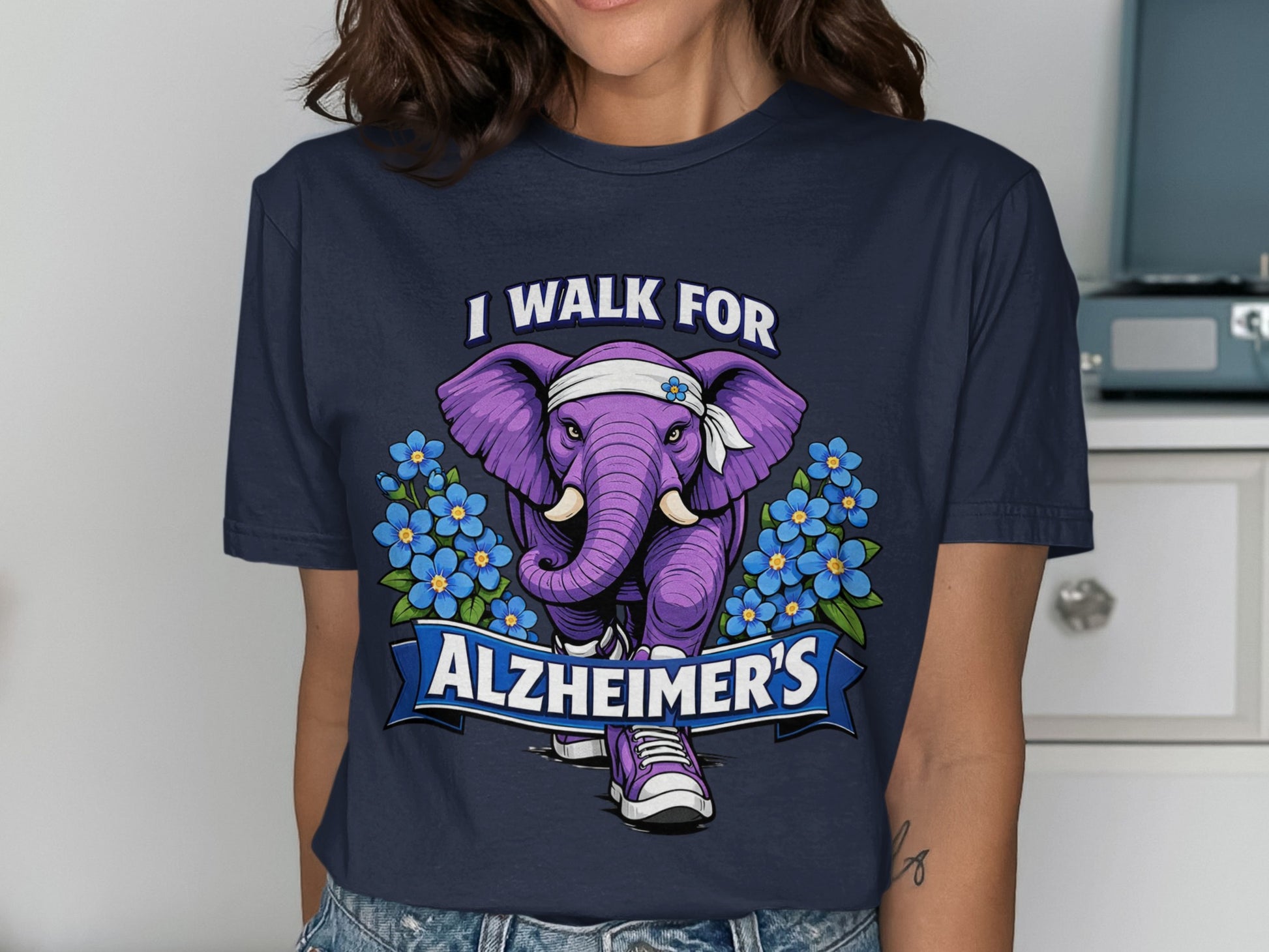 Purple elephant with forget-me-nots and banner saying "I walk for Alzheimer's".
