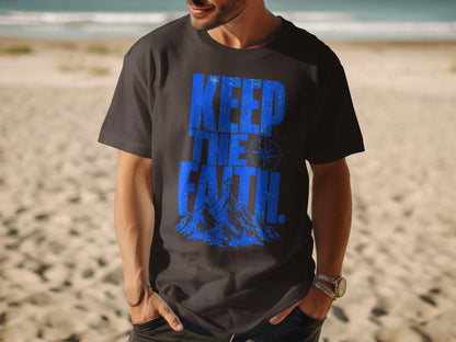Dark t-shirt with blue "KEEP THE FAITH" text and mountain graphic.