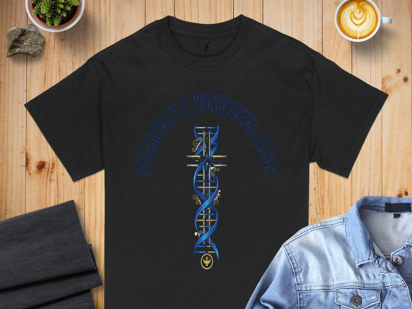 Black t-shirt with blue lettering "FEARFULLY & WONDERFULL MADE" and a DNA cross design.