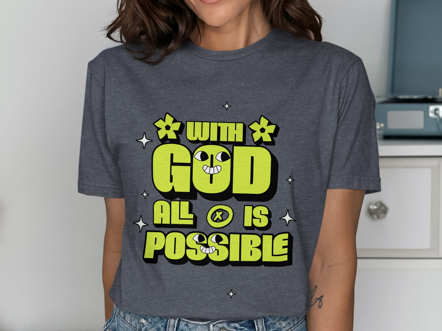 Dark grey t-shirt with "WITH GOD ALL IS POSSIBLE" in lime green text.