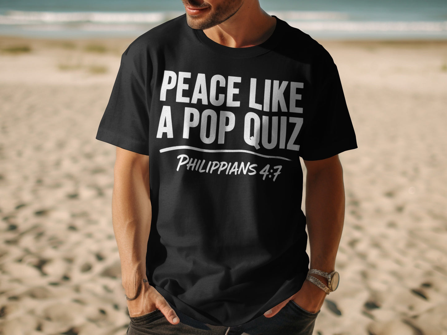 Black t-shirt with white text: "PEACE LIKE A POP QUIZ PHILIPPIANS 4:7"