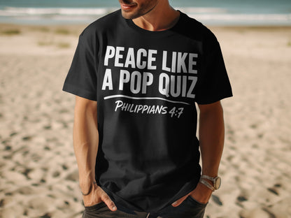 Black t-shirt with white text: "PEACE LIKE A POP QUIZ PHILIPPIANS 4:7"