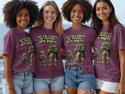 Four women wear purple shirts with a graphic of soldiers following footsteps.