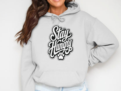 Light grey hoodie with black text "Stay Hungry" and paw print.