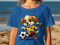 Cartoon dog in Colombian soccer uniform playing with a ball, holding a flag.