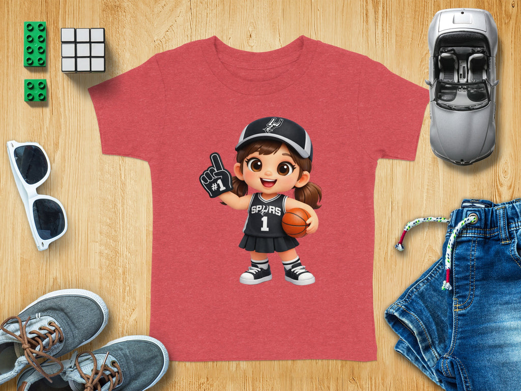 Red t-shirt with cartoon girl in Spurs jersey holding a basketball.