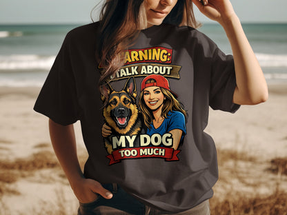 Warning: Talk About My Dog Too Much graphic on a dark t-shirt.