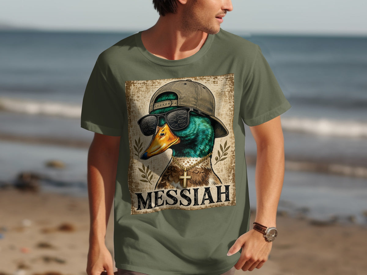 Green t-shirt with graphic of a duck wearing sunglasses and a hat, text "MESSIAH".