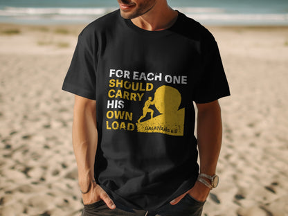Black t-shirt with text "FOR EACH ONE SHOULD CARRY HIS OWN LOAD GALATIANS 6:5" and a graphic.