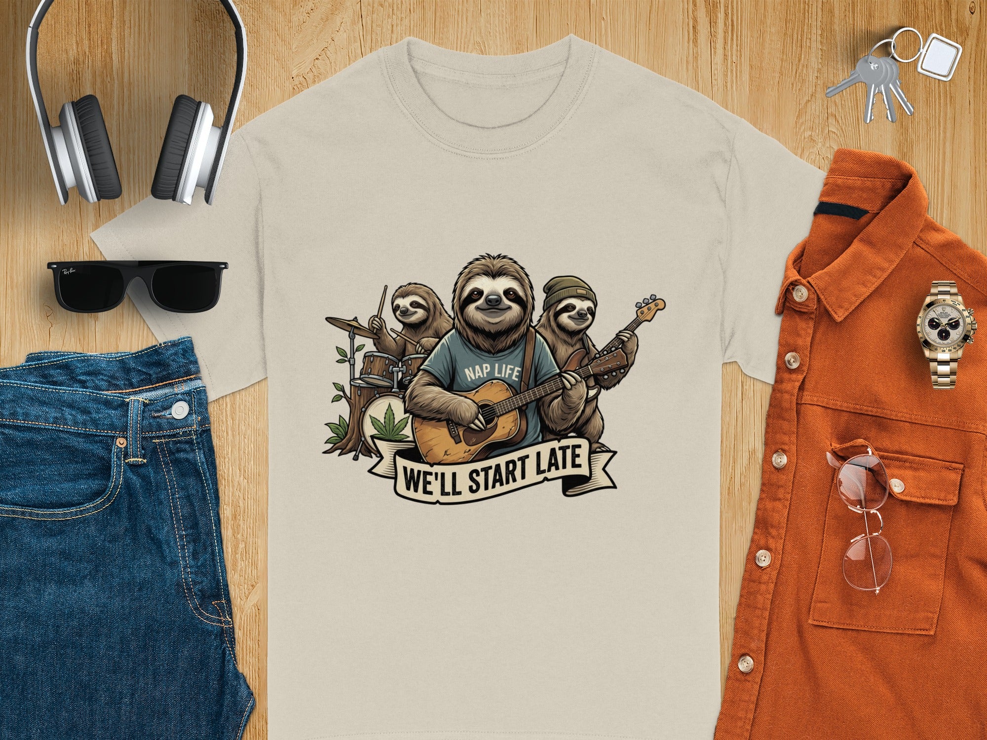 Sloths form a band with a guitar, drums, and text "NAP LIFE WE'LL START LATE".