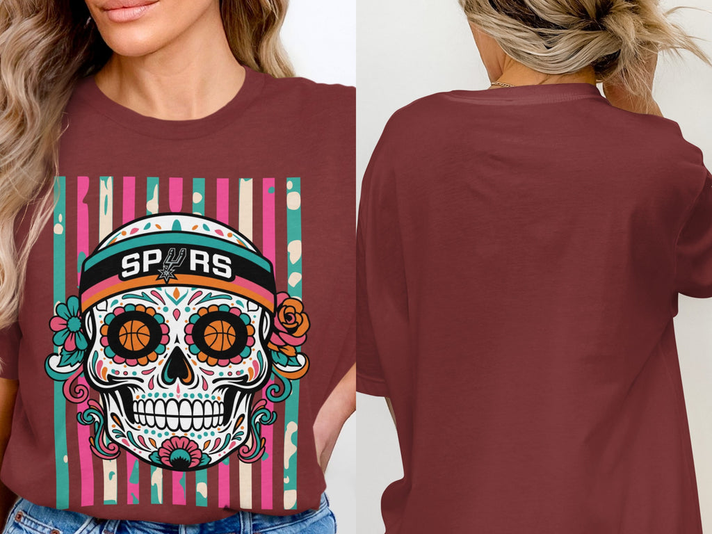 Maroon t-shirt with a colorful sugar skull print and "SPURS" text.