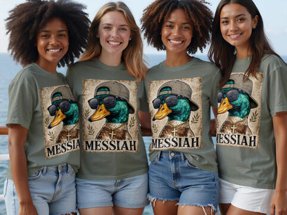 Four women wear olive green shirts featuring a graphic of a mallard duck wearing sunglasses and a cross necklace.