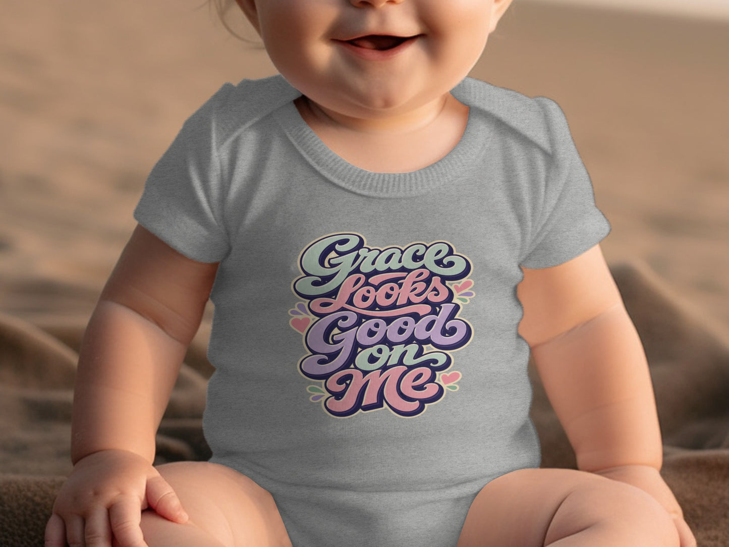 Gray baby bodysuit with "Grace Looks Good on Me" text design.