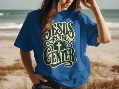 Blue t-shirt with "JESUS IS THE CENTER" text and a cross icon.
