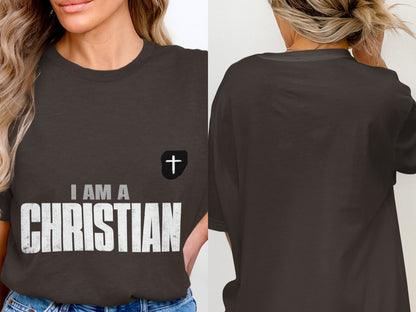 Dark grey t-shirt with white text "I AM A CHRISTIAN" and a cross emblem.