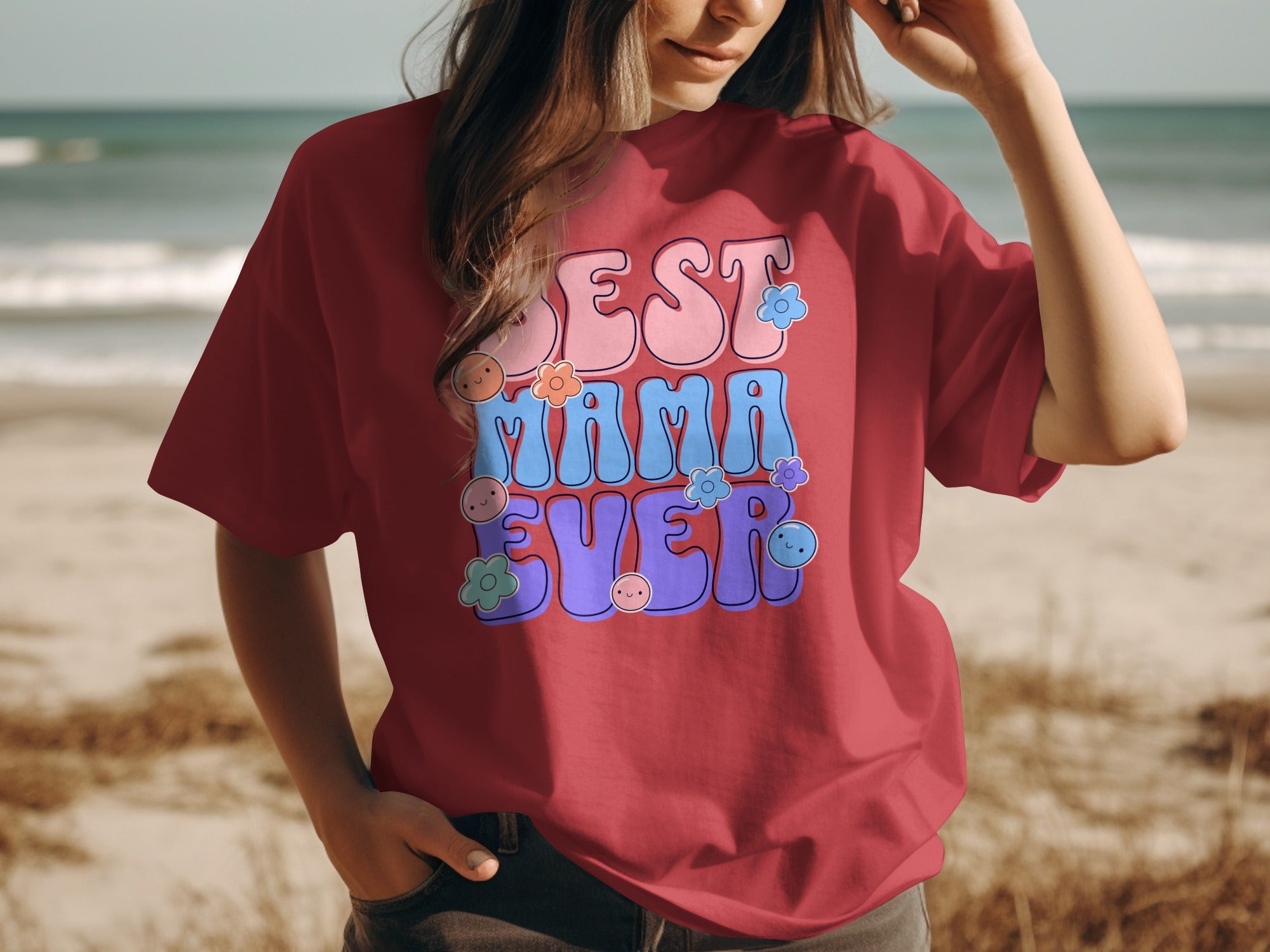 Red t-shirt with "BEST MAMA EVER" text and cartoon flowers.