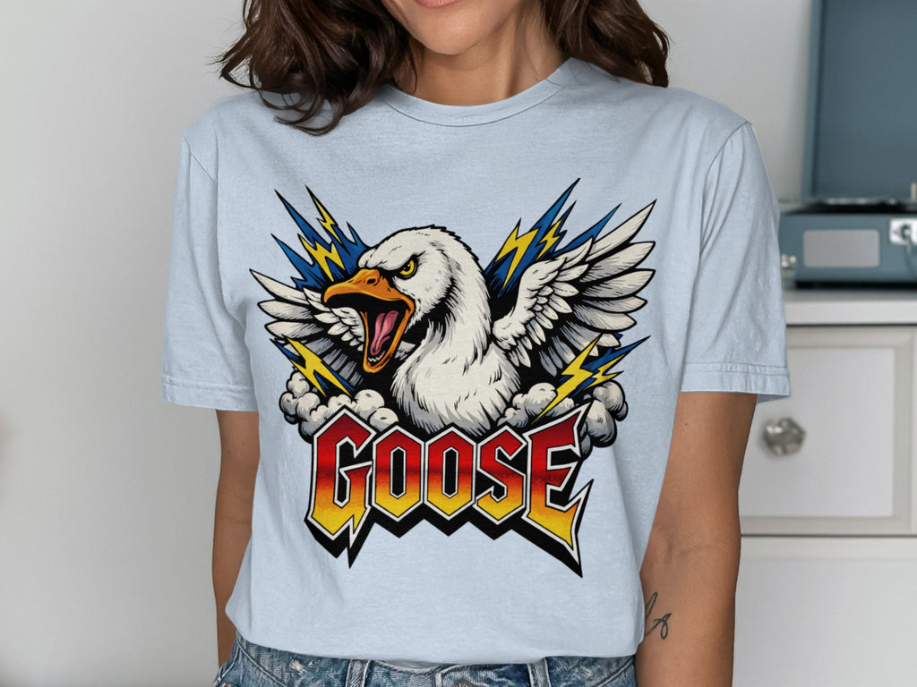 Goose graphic on light blue t-shirt with roaring goose and lightning bolts.