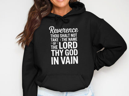 Black hoodie with white text: Reverence Thou Shalt Not Take the Name of the Lord Thy God In Vain.