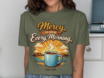 Green t-shirt with "Mercy Is New Every Morning Lam. 3:23" and sunrise coffee graphic.