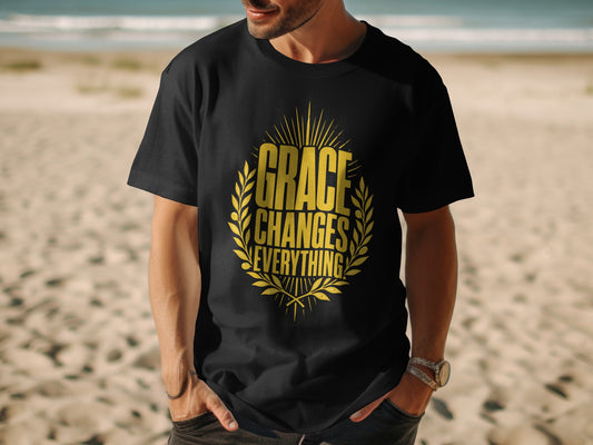 Black t-shirt with yellow text "Grace Changes Everything" in a laurel wreath.