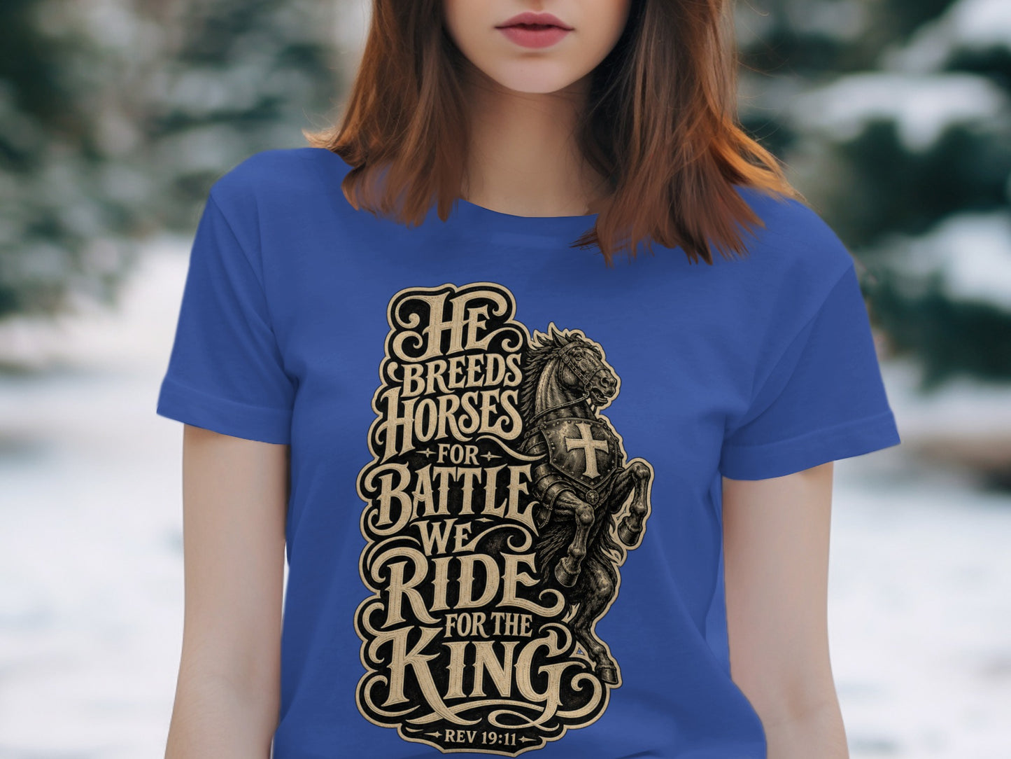 Blue t-shirt with "He breeds horses for battle, we ride for the King" and Rev 19:11.