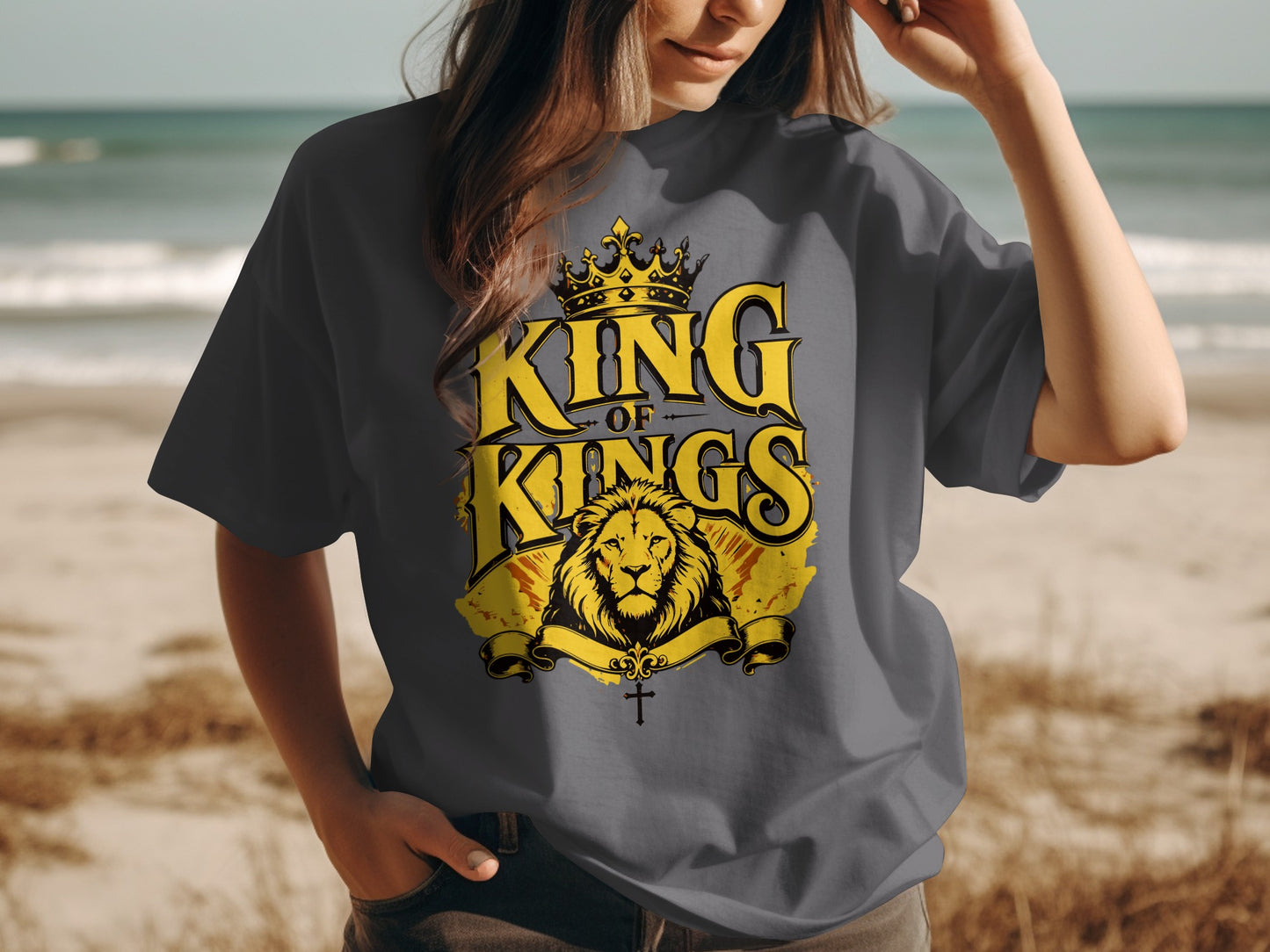 Grey t-shirt with yellow "KING OF KINGS" text, lion, crown, and cross design.