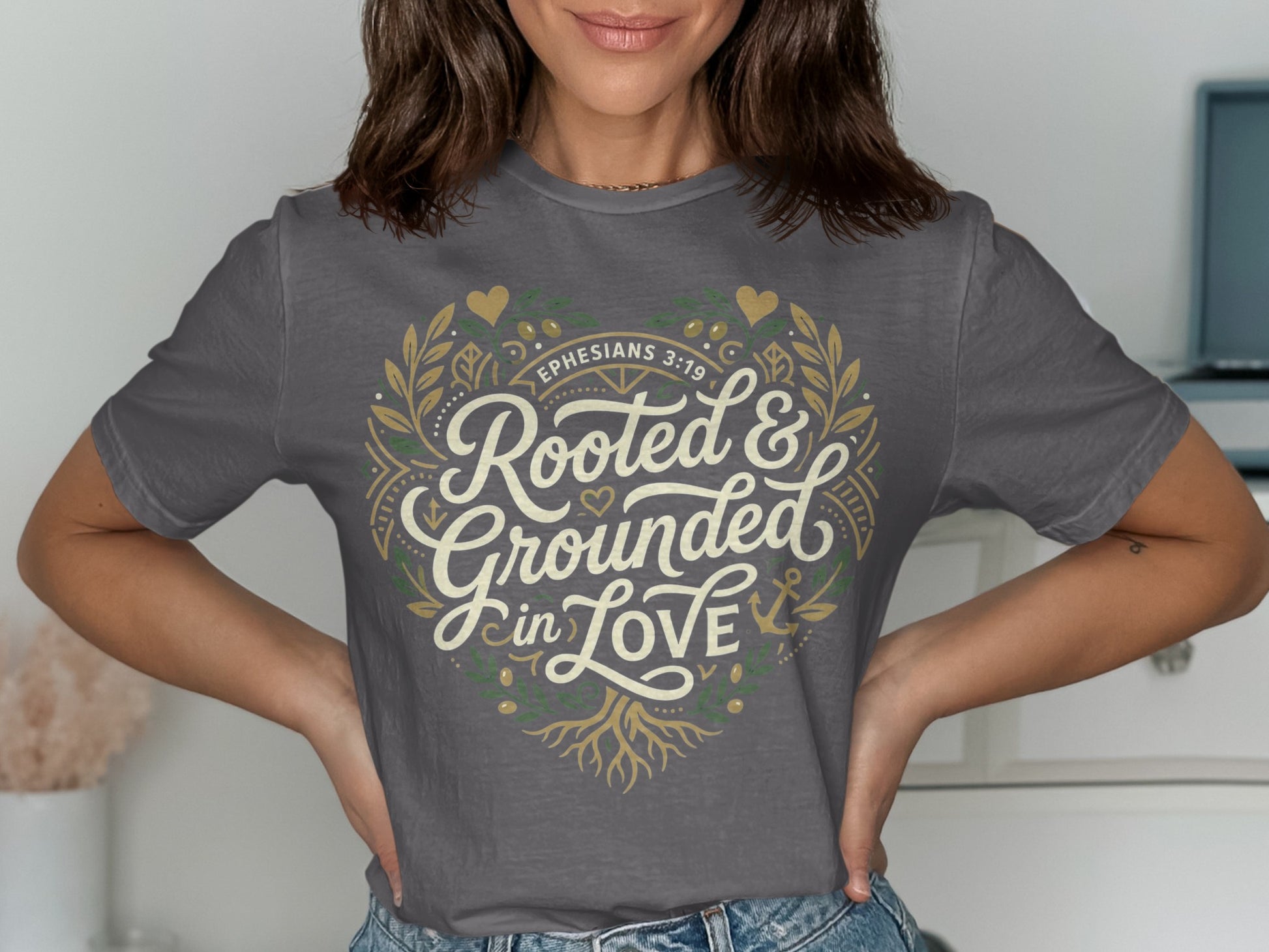Gray t-shirt with "Rooted & Grounded in Love" and Ephesians 3:19 text.