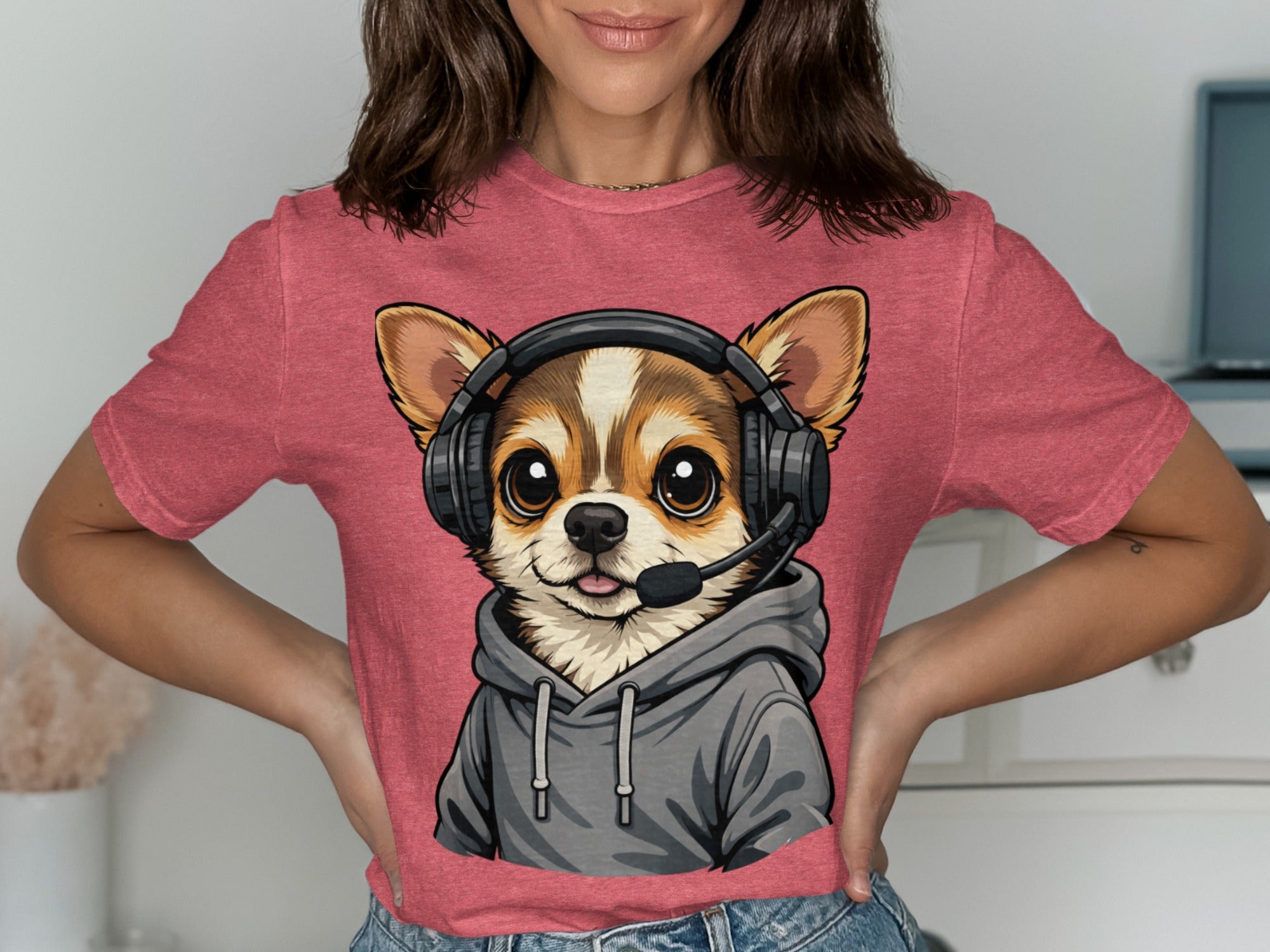 Chihuahua wearing headphones and hoodie illustration on a pink t-shirt.