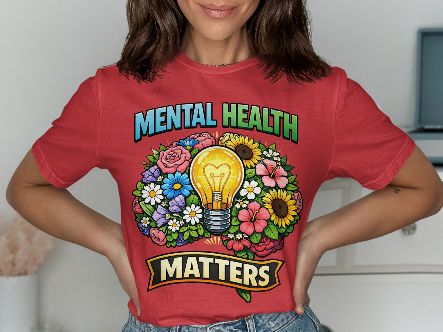 Red t-shirt with "Mental Health Matters" text surrounding a lightbulb in a floral wreath.