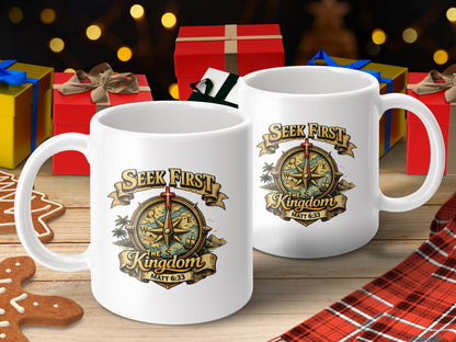 Two white mugs with a compass design reading "Seek First The Kingdom, Matt 6:33".