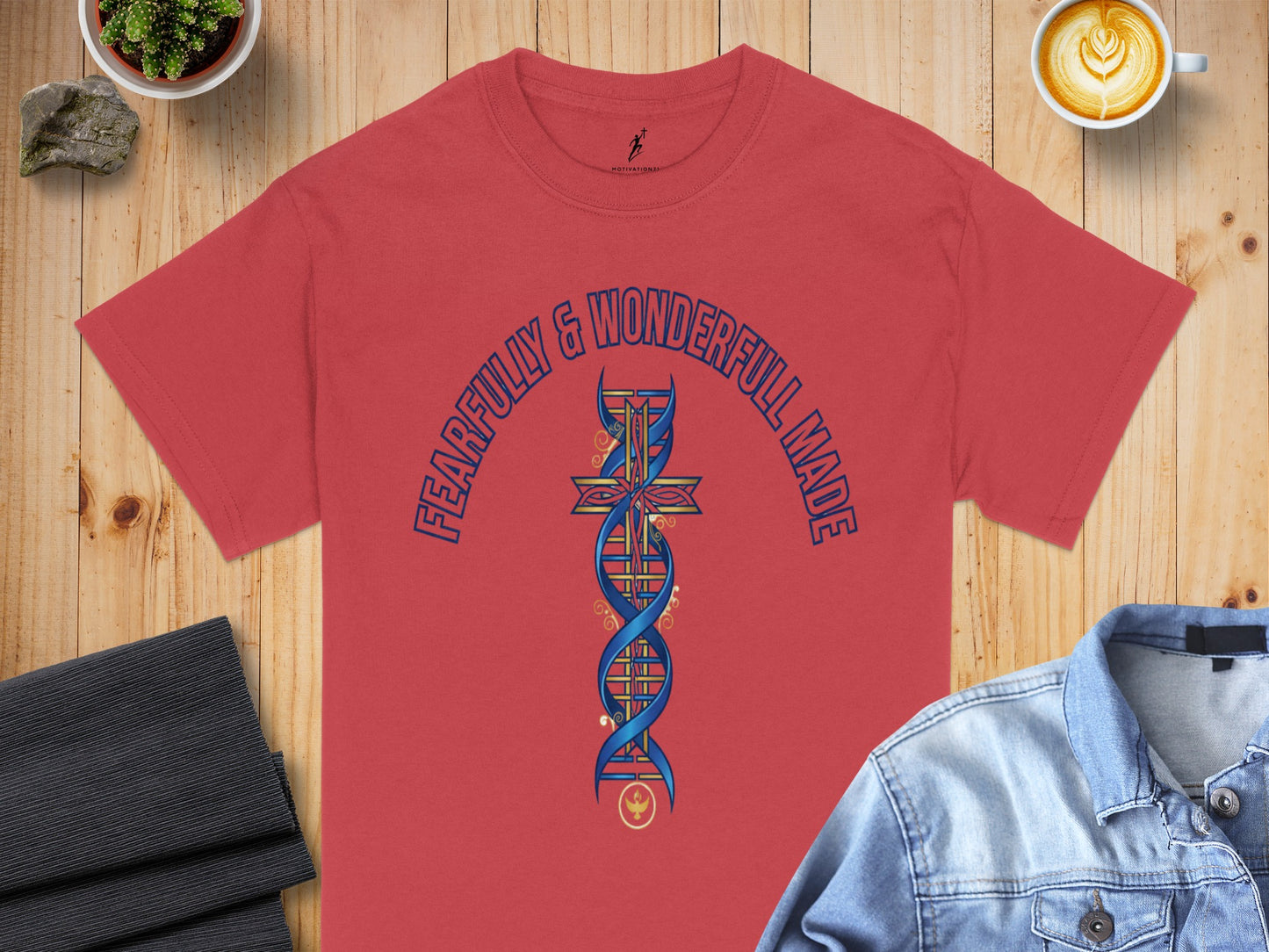 Red t-shirt with "FEARFULLY & WONDERFULL MADE" text and a DNA cross design.