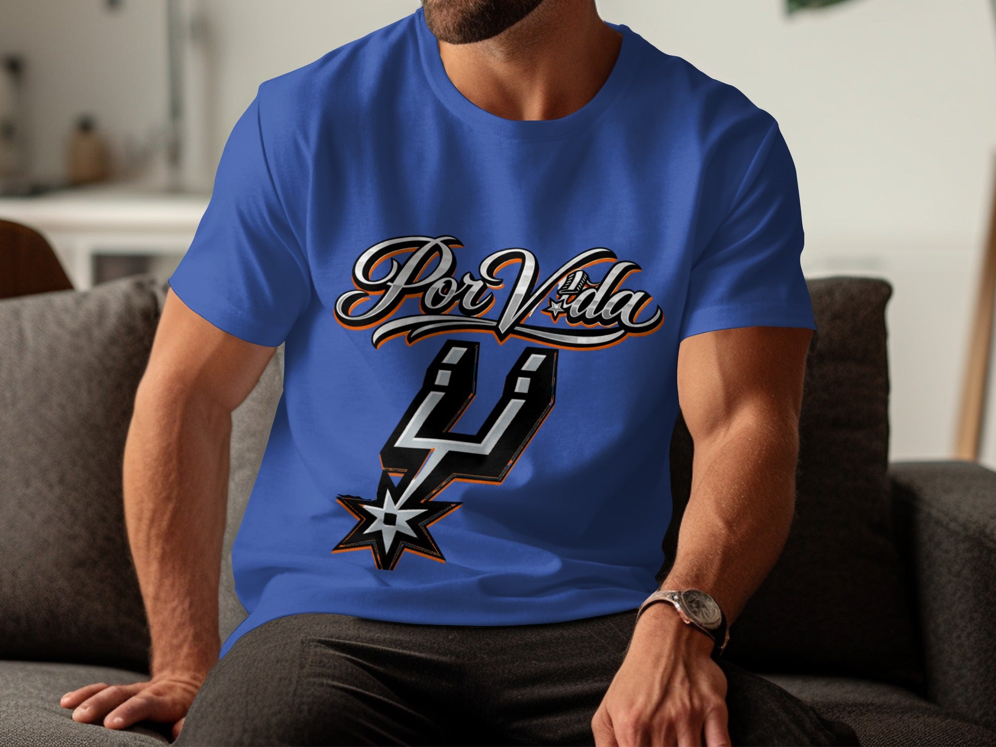 Royal blue t-shirt with "Por Vida" text and a spur logo.