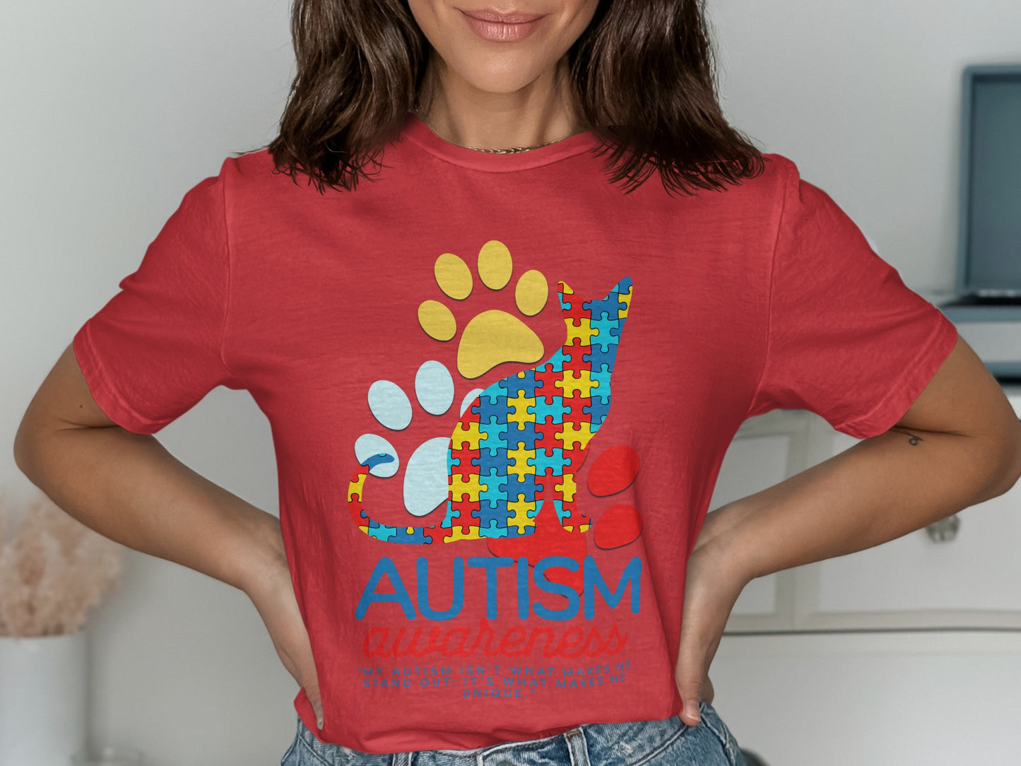 Red t-shirt with autism puzzle cat graphic and "Autism Awareness" text.