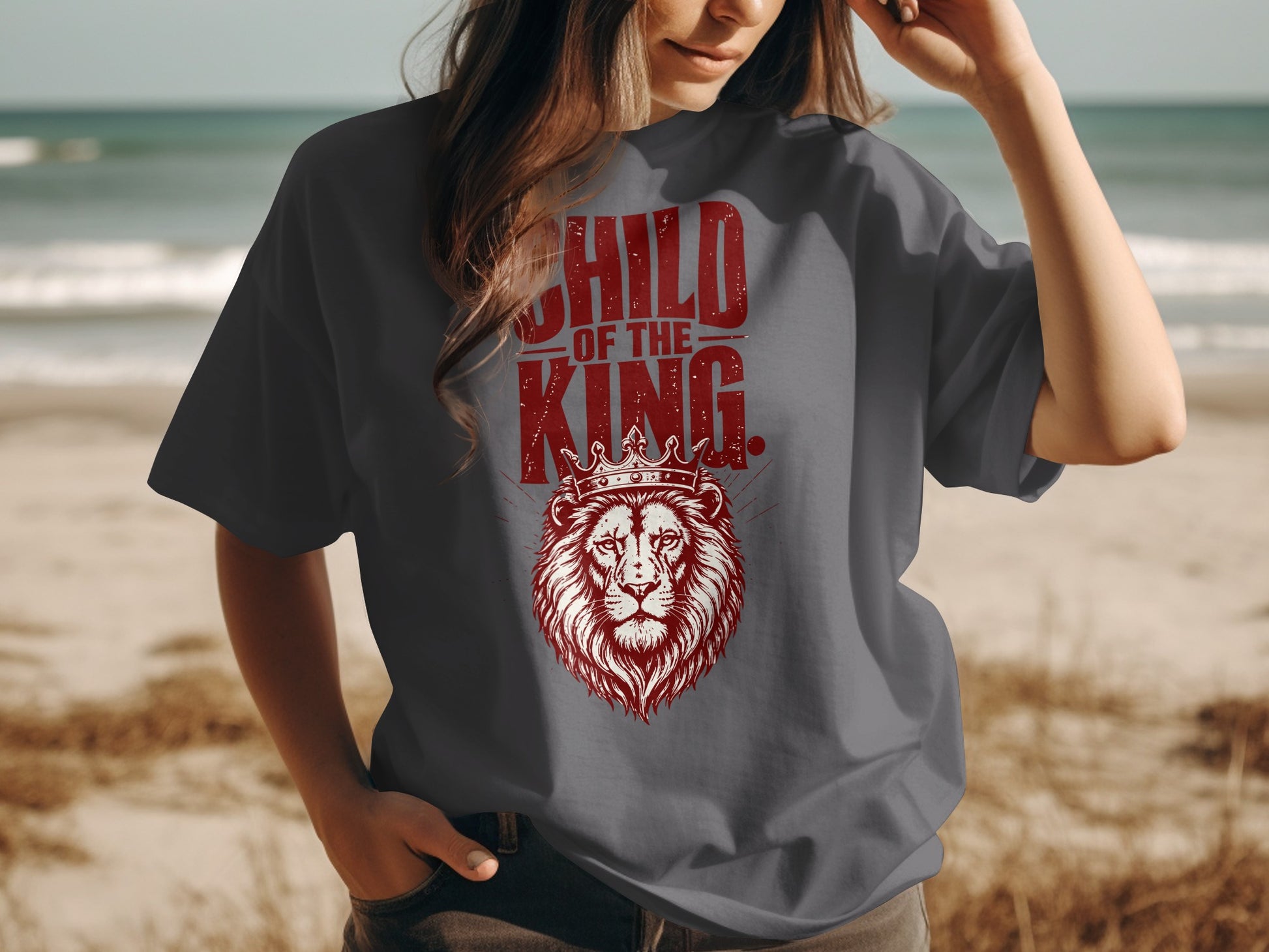 Gray t-shirt with red distressed graphic of a lion wearing a crown and text "CHILD OF THE KING".