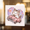 Cute cat driving a pink convertible, with a heart and cherry blossoms in the background.