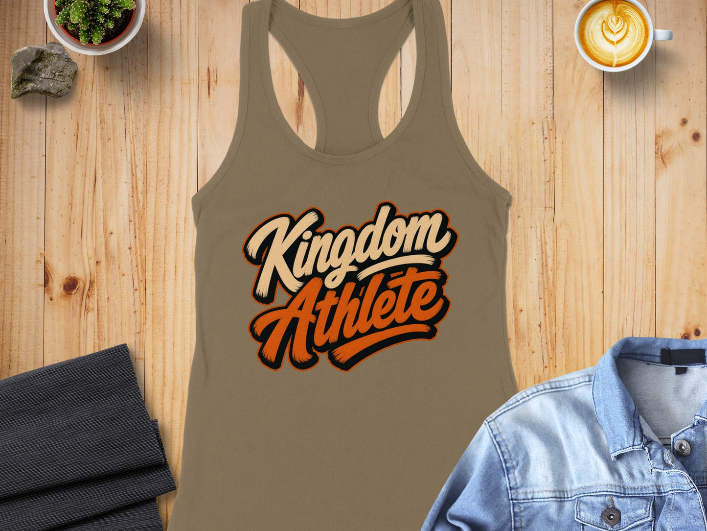 Tan racerback tank top with "Kingdom Athlete" text design.