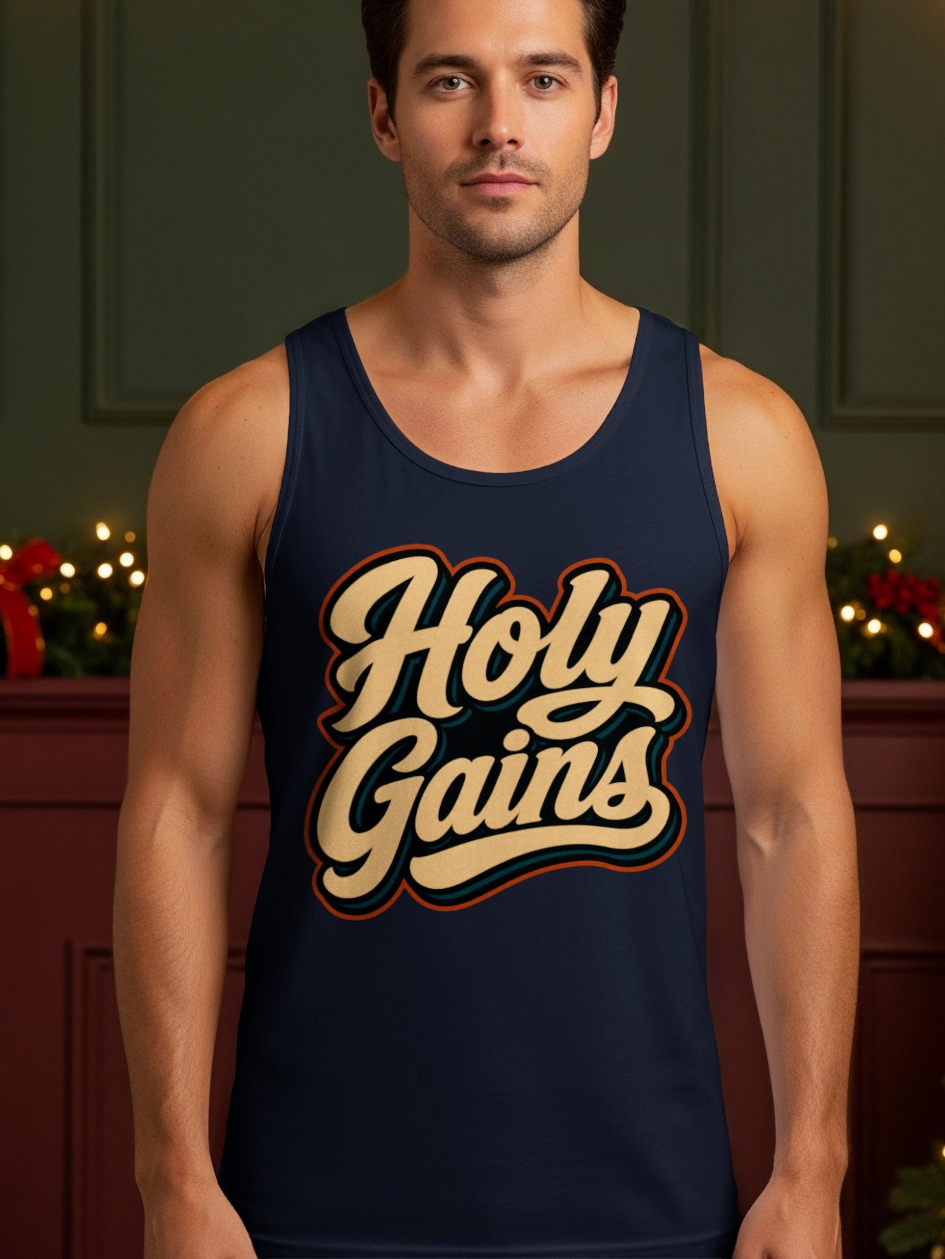 Dark blue tank top with "Holy Gains" text in vintage cream and orange lettering.