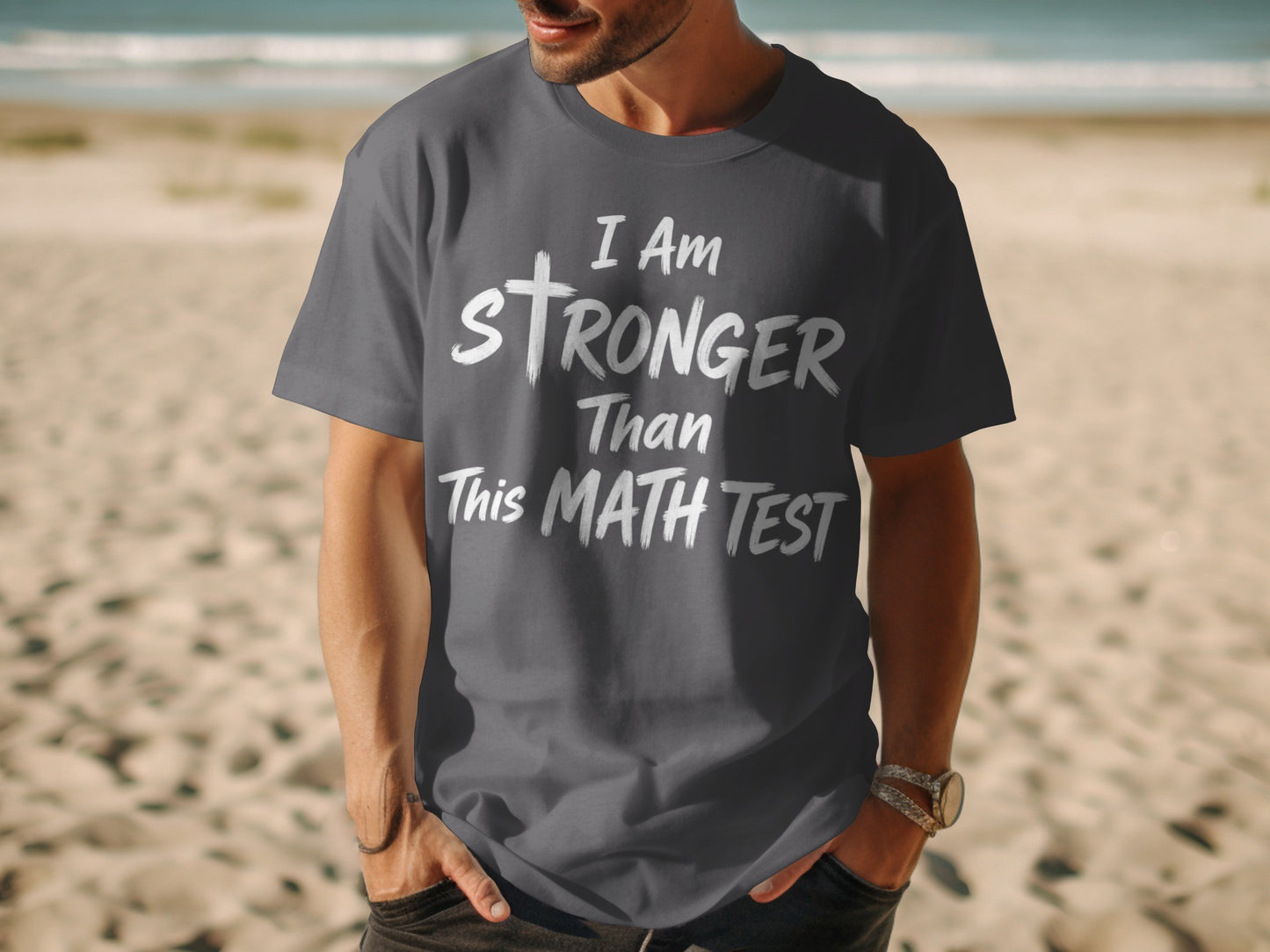 Grey t-shirt with white text: "I Am Stronger Than This Math Test."