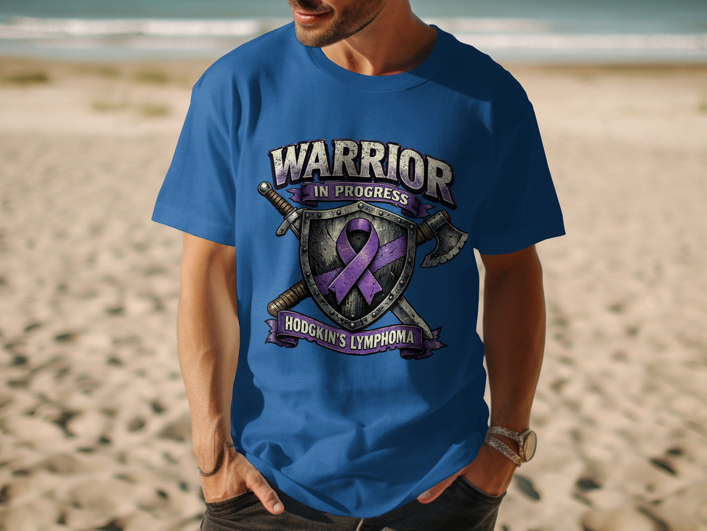 Blue t-shirt with "Warrior in Progress Hodgkin's Lymphoma" text and purple ribbon.