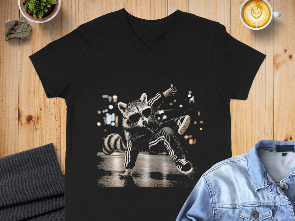 Black t-shirt with a dancing raccoon wearing sunglasses and a tracksuit.