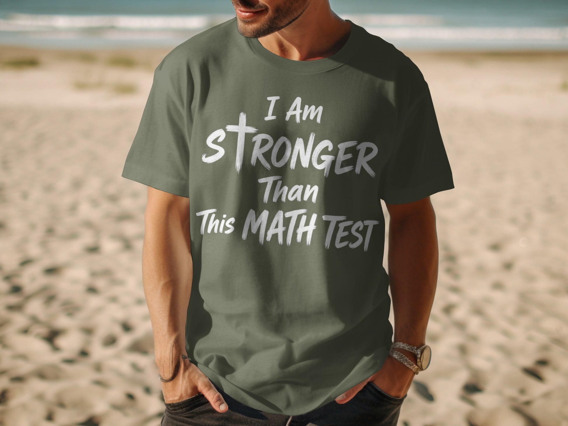 Green t-shirt with white text "I Am Stronger Than This MATH TEST".