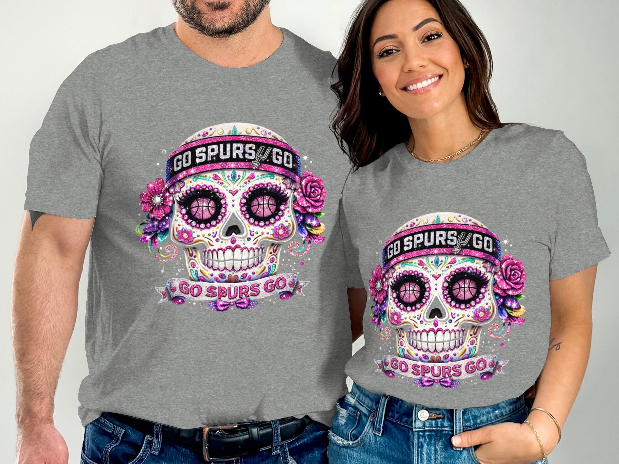 Two gray t-shirts feature a glittery sugar skull graphic with "GO SPURS GO".