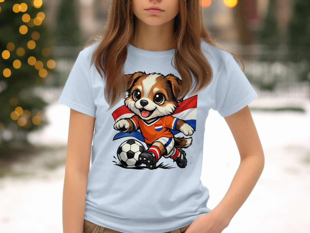 Cartoon dog wearing Dutch soccer jersey kicks soccer ball, with Dutch flag.