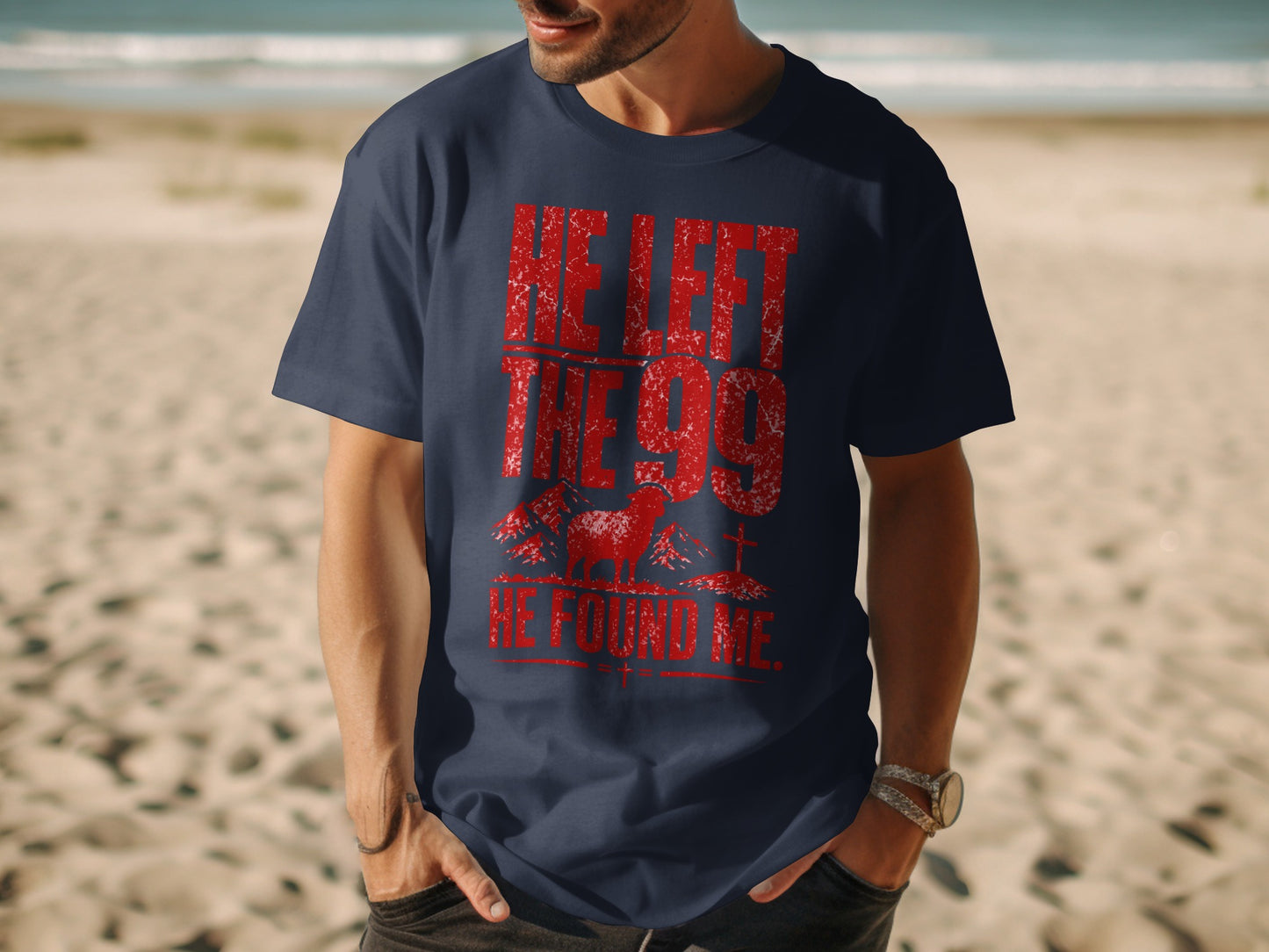 Navy t-shirt with distressed red text "HE LEFT THE 99 HE FOUND ME." and sheep graphic.