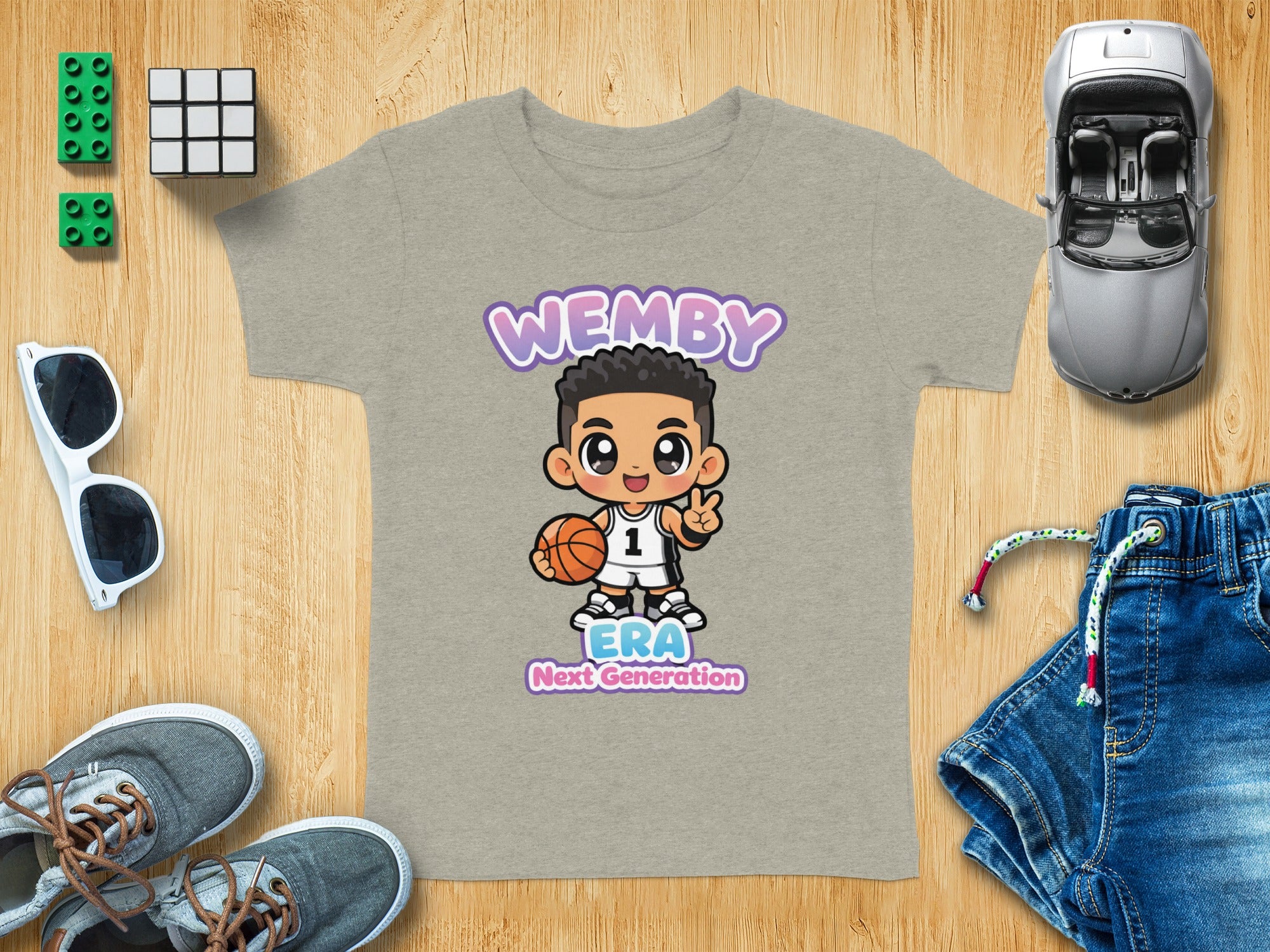 Children's grey t-shirt with "WEMBY ERA Next Generation" graphic.