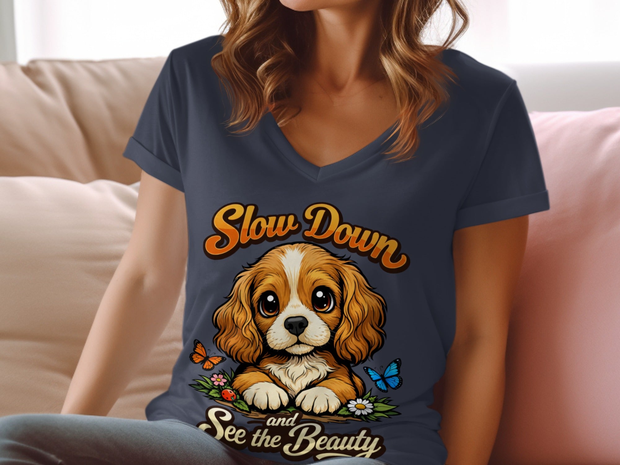 T-shirt with a Cavalier King Charles Spaniel puppy and text "Slow Down and See the Beauty".