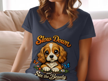 T-shirt with a Cavalier King Charles Spaniel puppy and text "Slow Down and See the Beauty".