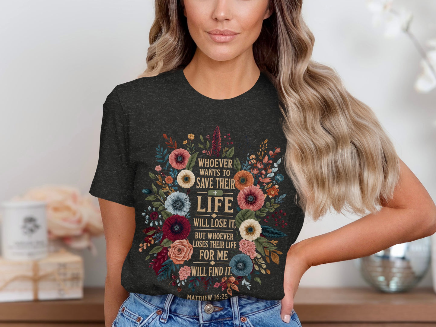 Dark t-shirt with floral wreath and Bible verse Matthew 16:25.