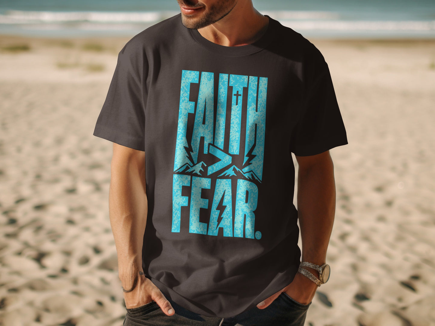 Dark grey t-shirt with blue "FAITH > FEAR" text and mountain graphic.